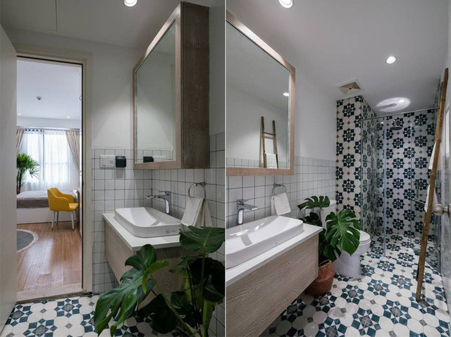 Góc phòng tắm được thiết kế ấn tượng với tường liền mạch với sàn bằng gạch ốp màu trắng xanh tăng cảm giác mát mẻ, dễ chịu cho mọi người khi sử dụng. Thêm điểm nhấn từ cây xanh để mọi góc nhỏ đều ngập tràn niềm vui và sức sống.