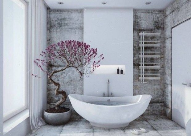 Tiếp tục là một mẫu bồn tắm đơn giản, màu trắng và kích thước nhỏ phù hợp với những không gian nhà tắm không quá lớn. Chỉ điểm thêm một chậu hoa là bạn đã có một phòng tắm lãng mạn lắm rồi.