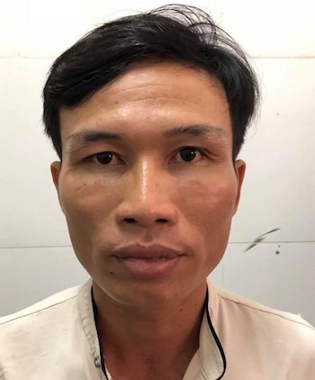 Trần Văn Hữu, 40 tuổi, tại cơ quan công an.