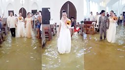 'Đám cưới của năm' với hình ảnh cô dâu Philippines mặc váy cưới lội nước vào nhà thờ 