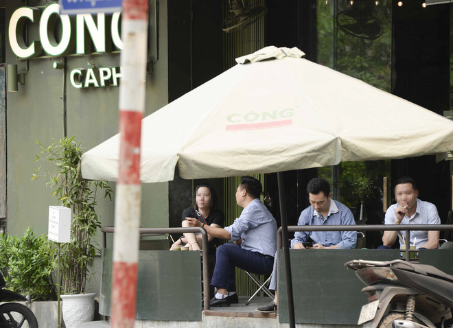 Bất chấp lệnh cấm, nhiều quán cà phê, bia hơi ở Hà Nội vẫn hoạt động - Ảnh 2.