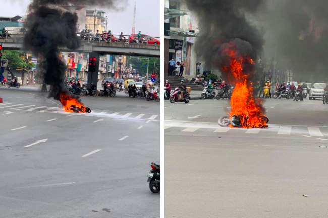 Chiếc xe máy bất ngờ cháy thành than giữa phố Hà Nội, hiện trường vụ việc khiến người xem đầy ám ảnh - Ảnh 1.