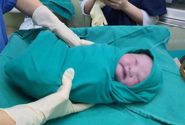 Những em bé được đặt tên cực độc do ra đời vào thời dịch bệnh Covid-19, nghe tên của bé người Việt ai cũng gật gù - Ảnh 1.
