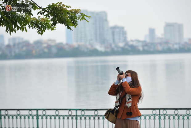 Ảnh: Người Hà Nội trở lại cuộc sống nhộn nhịp trong cuối tuần đầu tiên nới lỏng giãn cách xã hội - Ảnh 11.