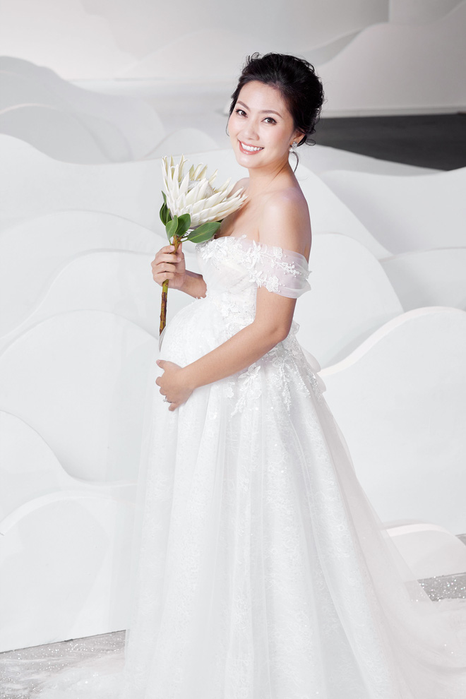 Ngọc Lan xinh đẹp rạng rỡ khi hóa thân cô dâu bầu trình diễn váy cưới  - Ảnh 4.