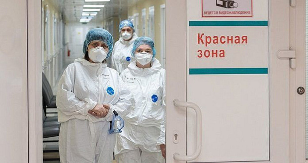 Dịch COVID-19 bùng phát mạnh tại Nga, hệ thống y tế có nguy cơ vỡ trận - Ảnh 1.