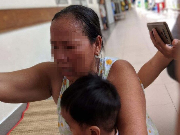 Khởi tố, bắt giam người mẹ đánh con chấn thương sọ não ở Sài Gòn - Ảnh 1.