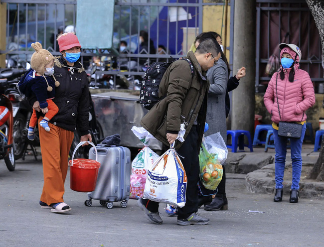 Sau Tết, người dân trở lại thành phố cần khai báo y tế và làm những gì? - Ảnh 1.