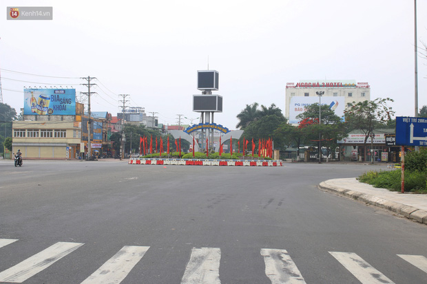 Bên trong TP. Vĩnh Yên ngày đầu cách ly xã hội: Vắng hơn sáng mùng 1 Tết, chỉ có tiếng ve kêu - Ảnh 1.