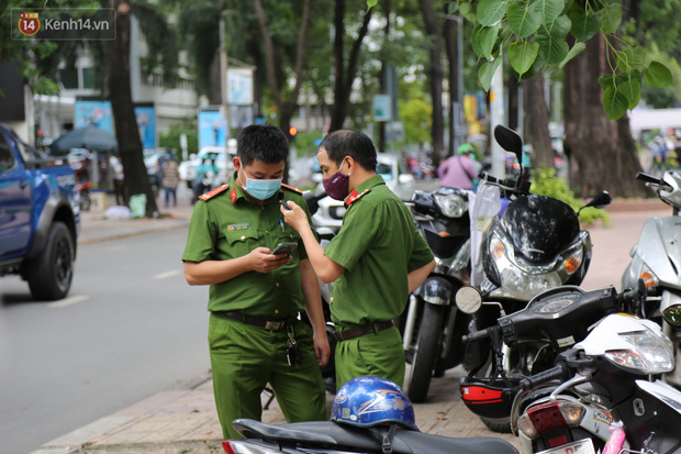 Ảnh: Phong tỏa tạm thời công ty kiểm toán tại TP.HCM do liên quan đến ca dương tính SARS-CoV-2 mới - Ảnh 2.