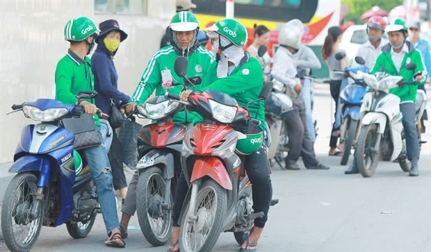 TP.HCM cho phép xe ôm công nghệ được hoạt động trở lại - Ảnh 1.