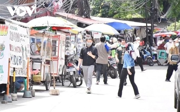 Indonesia dự báo đạt đỉnh lây nhiễm Omicron với hàng chục ngàn ca nhiễm mỗi ngày - Ảnh 1.