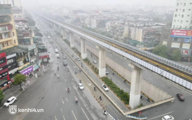 Ảnh: Nhiều tuyến phố Hà Nội, Sài Gòn ken đặc phương tiện trong ngày đầu đi làm sau kỳ nghỉ Tết Nguyên đán - Ảnh 10.