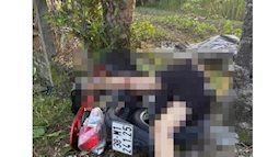Phát hiện 1 thi thể nữ giới bên đường có nhiều vết máu, nằm đè lên xe máy