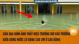 Xúc động hình ảnh thầy hiệu trưởng bơi giữa dòng nước lũ kiểm tra trường